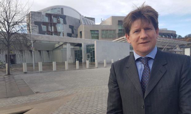 Alexander Burnett has raised concerns over the lack of specialist long Covid clinics across Scotland.