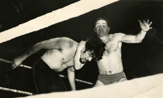 George Kidd wrestles Ivor Penzekoff at Caird Hall, Dundee, in January 1965.