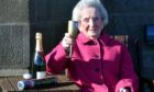 Catherine raises a glass on her 105th birthday