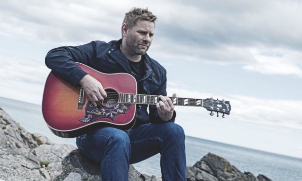 North-east singer-songwriter Colin Clyne has won a prestigious international song contest.