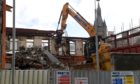The demolition of Mackays on Queen Street has begun.