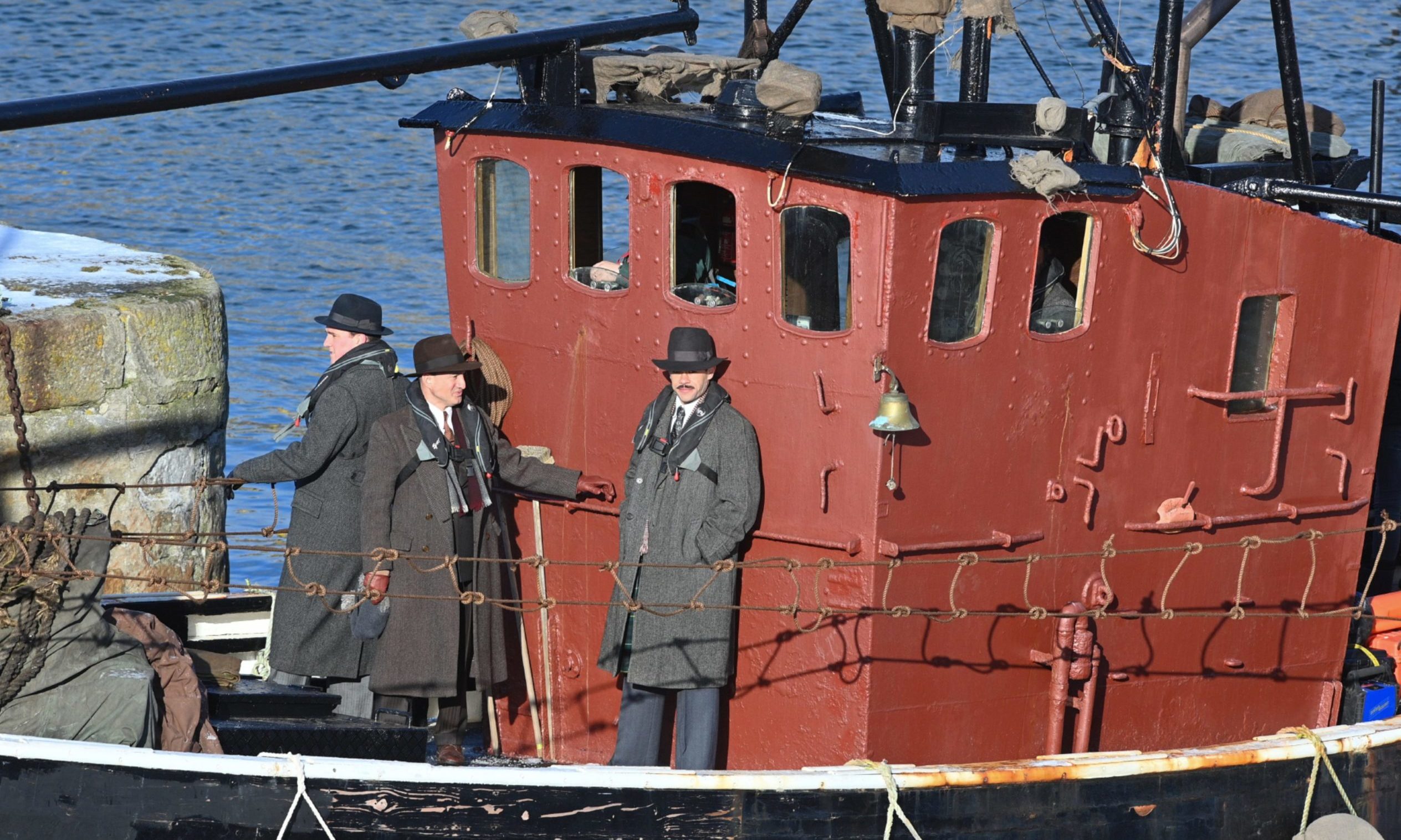 Some actors were seen on board a small red boat during Peaky Blinders filming.