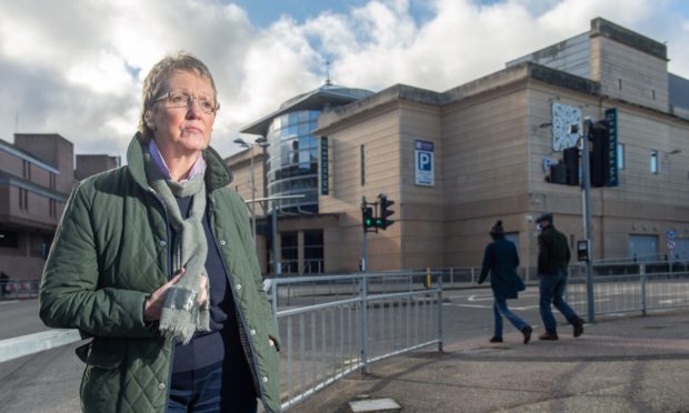 Councillor Janet  outside the Eastgate Shopping Centre.