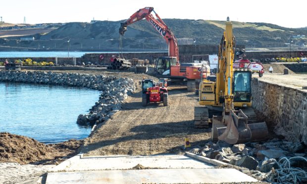 Pictures by JASON HEDGES    
26.02.2021 URN:CR0026866
Repairs are underway at Banff Harbour, Aberdeenshire.
Pictures by JASON HEDGES