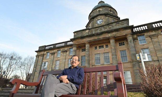 Dr Sandip Halder outside Dr Gray's Hospital in Elgin.