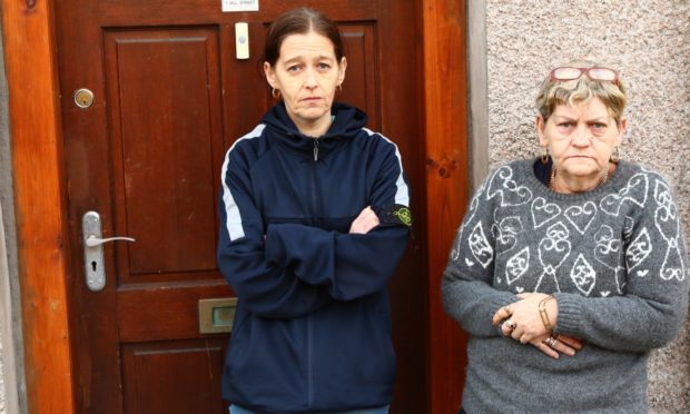 Kellie McCuish, (left) is being forced out of her flat by rats. She is spending most of her time in her mother (right) Mary McCuish's flat downstairs.