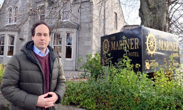 Councillor Martin Greig at the former Mariner Hotel, Great Western Road, Aberdeen.