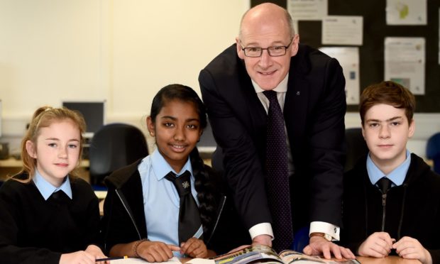 Pictured Deputy First Minister John Swinney