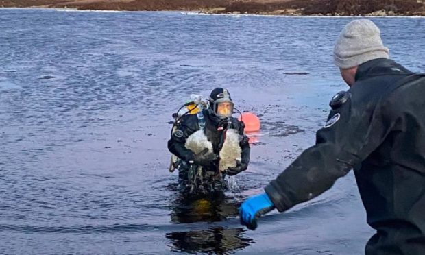Divers working at Loch Fada in North Uist.