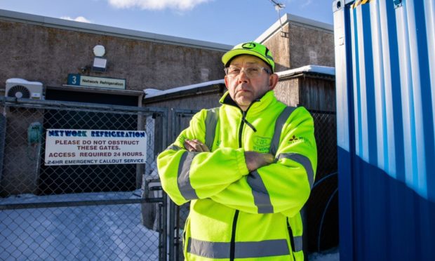 Sam Summersbee of  Network Refrigeration, Balintore outside the unit where specialst copper wiring was taken following a break in at the yard.