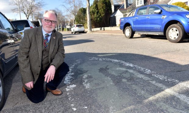 Councillor John Cooke highlighted worn out 20mph signs painted on Angusfield Avenue in April 2019. He wants officers to assess whether more could 20mph zones should be introduced in Aberdeen.
