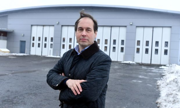 Councillor Martin Grieg outside North Anderson Drive Fire Station.