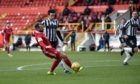 Aberdeen's Niall McGinn and St Mirren's Joe Shaughnessy pictured on Saturday, after McGinn slipped when through on goal. Picture by Darrell Benns