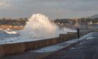 Waves batter the coast at Portgordon during stormy weather late last year.