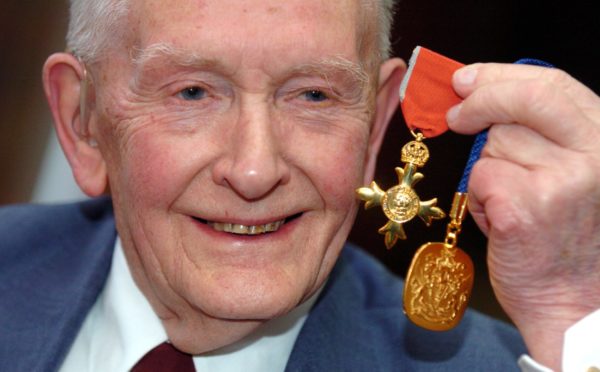 Prof John Mallard with two of his awards his OBE and the Royal College of Radiologists Gold Medal.

Picture by KAMI THOMSON          .21-05-09