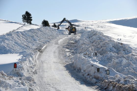 Snow clearing between Grantown and Bridge of Brown. Road currently closed