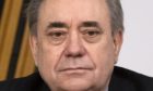 Former first minister Alex Salmond prepares to give his opening statement to the committee.