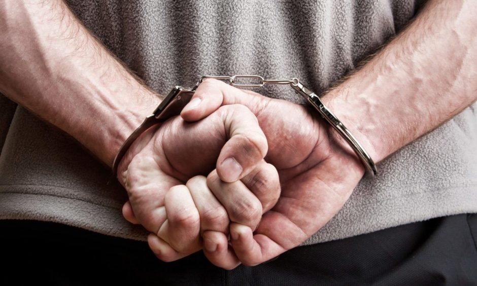 Prisoner in handcuffs