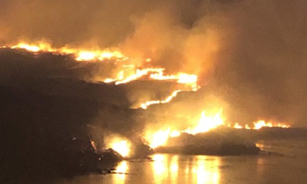 An image of the wildfire last night on Benbecula. Picture from Ruaridh Steele/PA Media