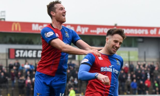Brad Mckay (right), is congratulated by Jordan White after scoring the winner against Ayr in April 2019.