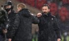 Aberdeen manager Derek McInnes (right) fist bumps Celtic manager Neil Lennon after the William Hill Scottish Cup semi final match at Hampden Park in November.