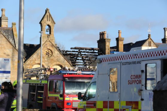 Pictures show extensive damage to the roof of the building