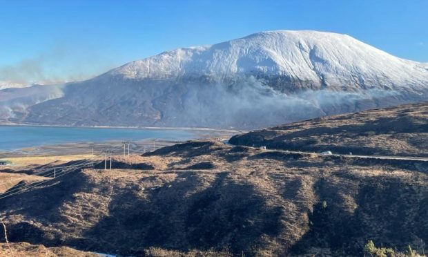 The main road through Skye has been closed as firefighters tackle a wildfire near Luib