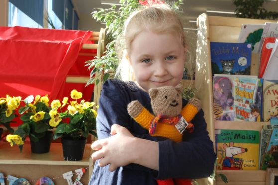 Chloe Miller with her teddy.