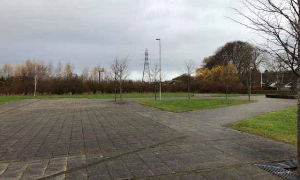 Holm community council wants to use ground next to the paved area for a community growing project