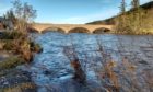 The River Dee in Ballater after a period of heavy rain and snowfall  Picture shows; The River Dee in Ballater after a weekend of heavy rain and snowfall .