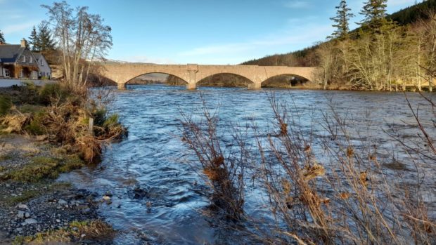 The River Dee in Ballater after a period of heavy rain and snowfall  Picture shows; The River Dee in Ballater after a weekend of heavy rain and snowfall .