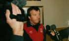 Former Dons boss Alex Smith address the media following his dismissal by the Dons in 1992.