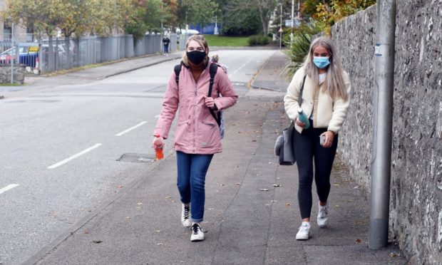 Students take a walk on Don Road, Aberdeen.