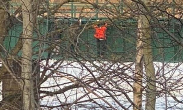 Children were spotted dangerously climbing on the bridge over the River Don at Port Elphinstone