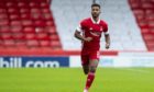 x
ABERDEEN, SCOTLAND - SEPTEMBER 12: Aberdeen's Shay Logan in action during the Scottish Premiership match between Aberdeen and Kilmarnock at Pittodrie on September 12, 2020, in Aberdeen, Scotland. (Photo by Ross MacDonald / SNS Group)