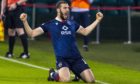 Ross County's Alex Iacovitti celebrates after making it 2-0 against Celtic in the Betfred Cup.