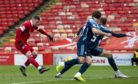 Florian Kamberi fires in a shot for Aberdeen. He scored just once during a loan spell.