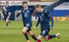 Ross County forward Billy McKay celebrates making it 3-1 against Kilmarnock with Blair Spittal.