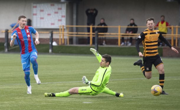 Inverness' Shane Sutherland misses a chance on goal against Alloa.