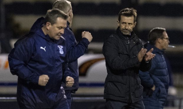 Interim Inverness coaching staff Billy Dodds (L) and Neil McCann celebrate at full-time after last night's win over Raith Rovers.