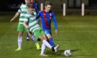 Mark McLauchlan, left, and Roddy MacGregor battle for the ball