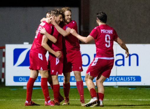 Mark Nicolson (right) celebrates Martin Maclean's winner against Hearts.