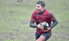 Doug Russell in action for Aberdeen Grammar last season. Picture by Colin Rennie