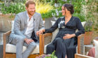 Prince Harry, left, and Meghan, Duchess of Sussex, speaking about expecting their second child during an interview with Oprah Winfrey.