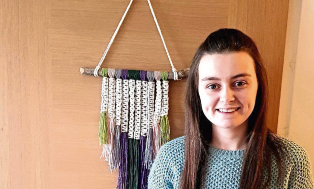 Alison MacDonald, who launched her business LotsofKnotts Macrame, producing custom macrame hanging decor and fibre rainbows, during lockdown.