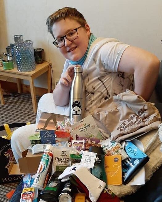 James McIntosh, 13, with his mental health hamper.