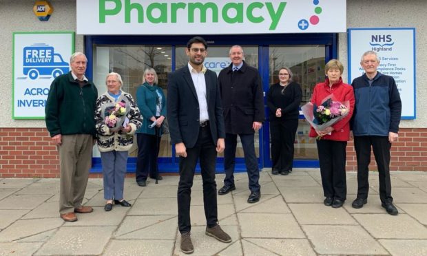 Left to right, community councillors Ken and Jean Cox, Jackie Agnew NHS Highland Pharmacy Services, pharmacist and shop owner Mo Ameen, Councillor Duncan Macpherson, Sophie Campbell pharmacy dispenser, Kath and Bob Fraser, who were community councillors who helped lead the pharmacy public consultation.