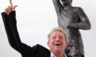 Denis Law at the unveiling of a statue in his likeness at Aberdeen Sports Village in 2012.