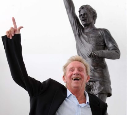 Denis Law at the unveiling of a statue in his likeness at Aberdeen Sports Village in 2012.