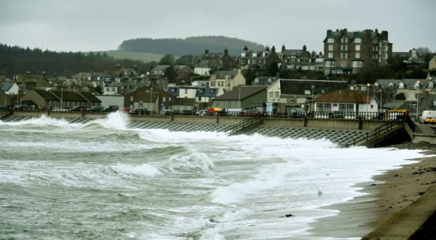 Flood barriers are installed in Stonehaven last year. Picture by Chris Sumner